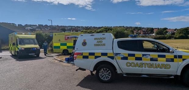 The Argus: Emergency services at the scene after a group of children were rescued from the sea by members of public in Saltdean