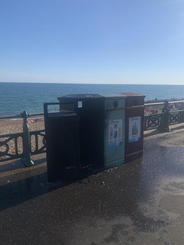 The Argus: A rubbish bin was badly damaged after a fire near the beach in Hove on Sunday 10th July