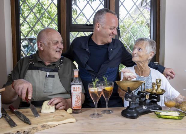 The Argus: PIGEON Founder, Mark Ward with his parents in their family home