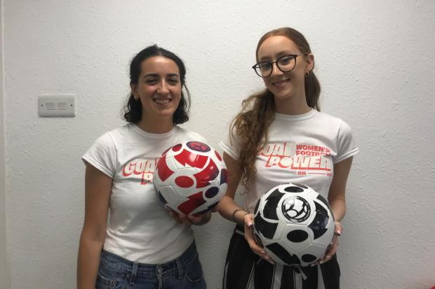 The Argus: Jasmyn Fraser and Lucy Finch, right, are hiding the footballs around the city