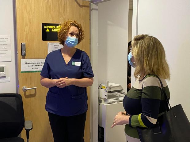 The Argus: Lewes MP Maria Caulfield speaking to a staff member at the Brighton Diagnostic and Treatment Centre
