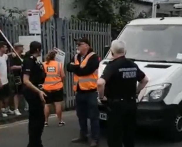 The Argus: Gary Palmer talking with police officers outside the depot. Video from @GMBSouthern