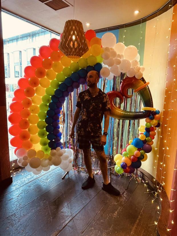 The Argus: Danial Palmer-Johnson, general manager at Las Iguanas, Brighton, with some of his restaurant's decorations