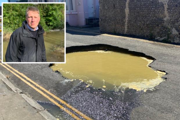 James MacCleary, Lib Dem parliamentary candidate for Lewes, inset, has called on the government to ban bonuses for water company bosses. Pictured is a recent sinkhole in Seaford
