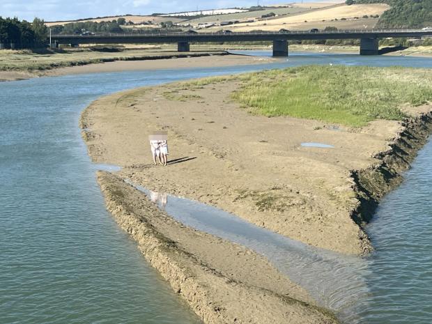 The Argus: Two young adults rescued from the Adur River by several rescue workers