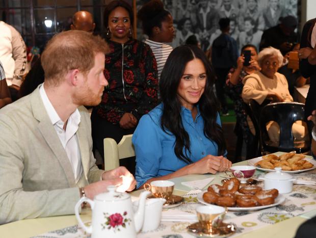 The Argus: Duke and Duchess of Sussex visiting District Six Homecoming Center in Cape Town, South Africa