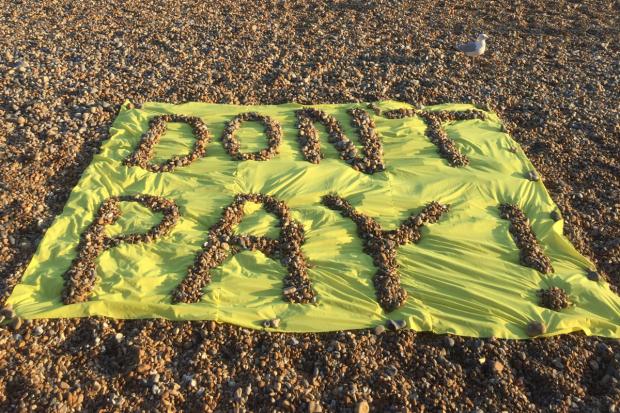 The Argus: Activists left their message on Brighton beach