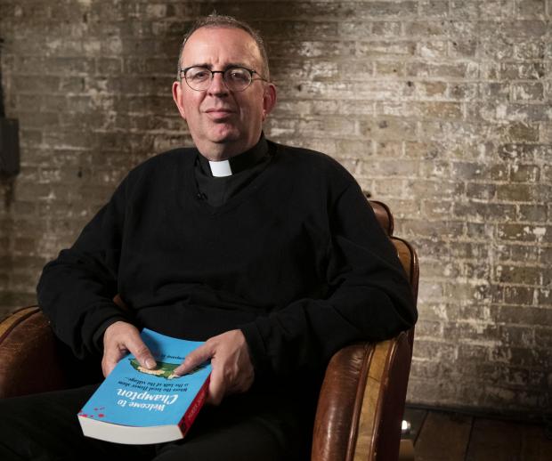 The Argus: Reverend Richard Coles with his new book