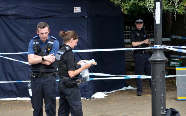 The Argus: Police on Sunday at the crime scene. Credit: PA