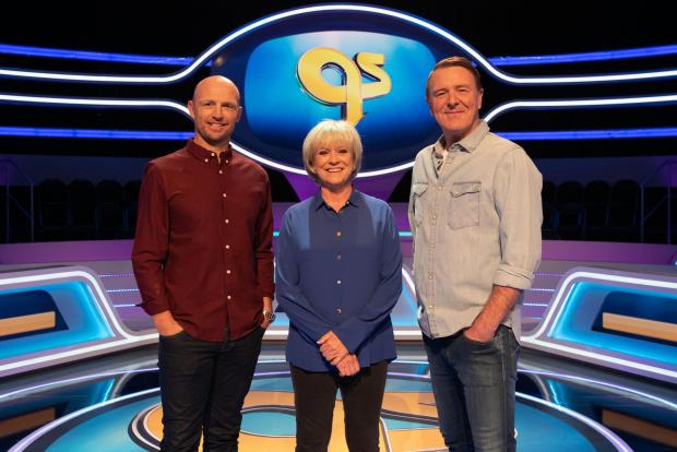 The Argus: Sue Barker with A Question of Sport captains Matt Dawson (left) and Phil Tuffnell (Vishal Sharma/BBC/PA)