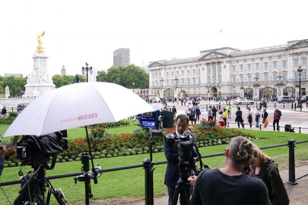 The Argus: Media representatives outside Buckingham Palace in central London