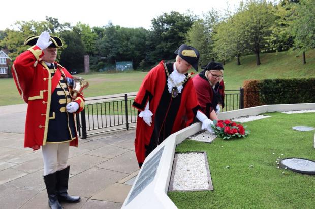 The Argus: Flowers are laid at the Hastings War Memorial