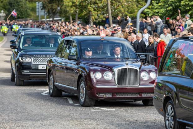 The Argus: The Queen's funeral procession passes through Duthie Park in Aberdeen on Sunday