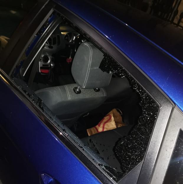 The Argus: The smashed window of a nearby car