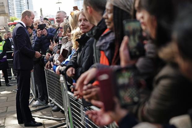 The Argus: Prince of Wales visits those waiting in line of state (Aaron Chown/PA Wire)
