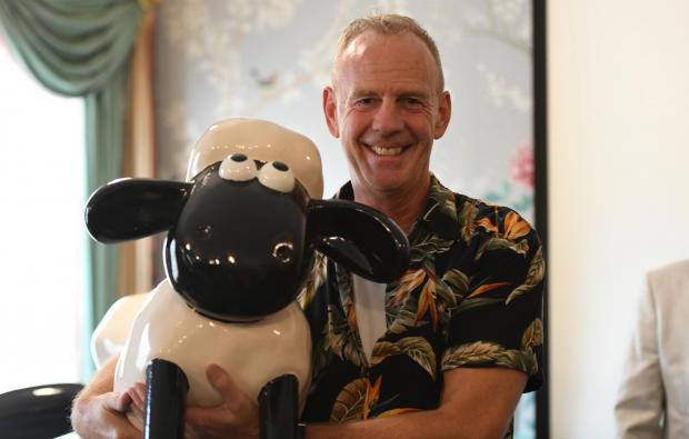 The Argus: DJ Fatboy Slim with Shaun the Sheep: credit - Martlets