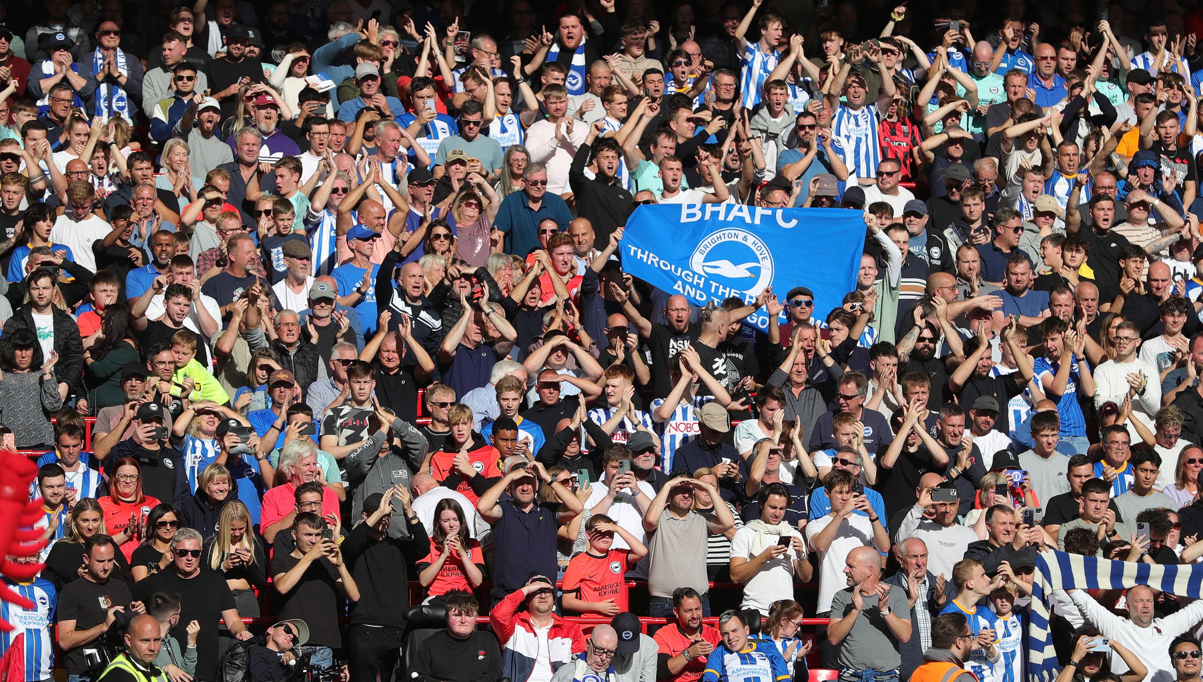 Brighton fans celebrate Trossard hat-trick against Liverpool