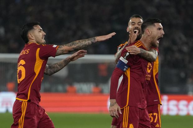 Roma celebrate as they beat Feyenoord in the Europa League play-off round