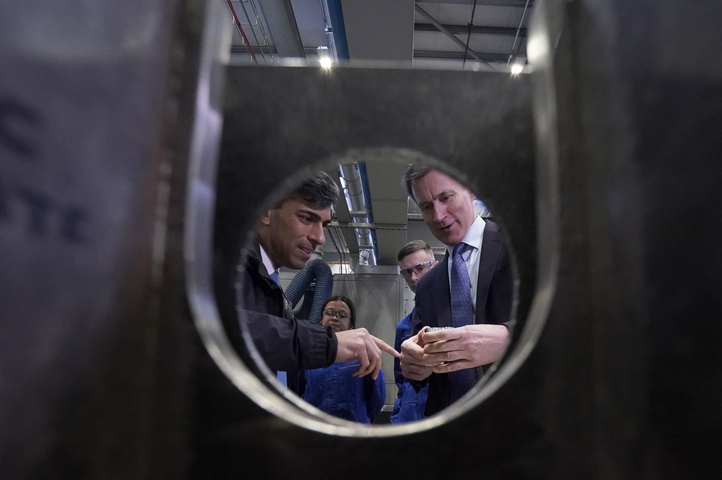 Prime Minister Rishi Sunak and Chancellor of the Exchequer Jeremy Hunt during a visit to an engineering firm in Barrow-in-Furness, in Cumbria. The Prime Minister has touted a new fund backed by 20 million in public money to secure the future of the UKs
