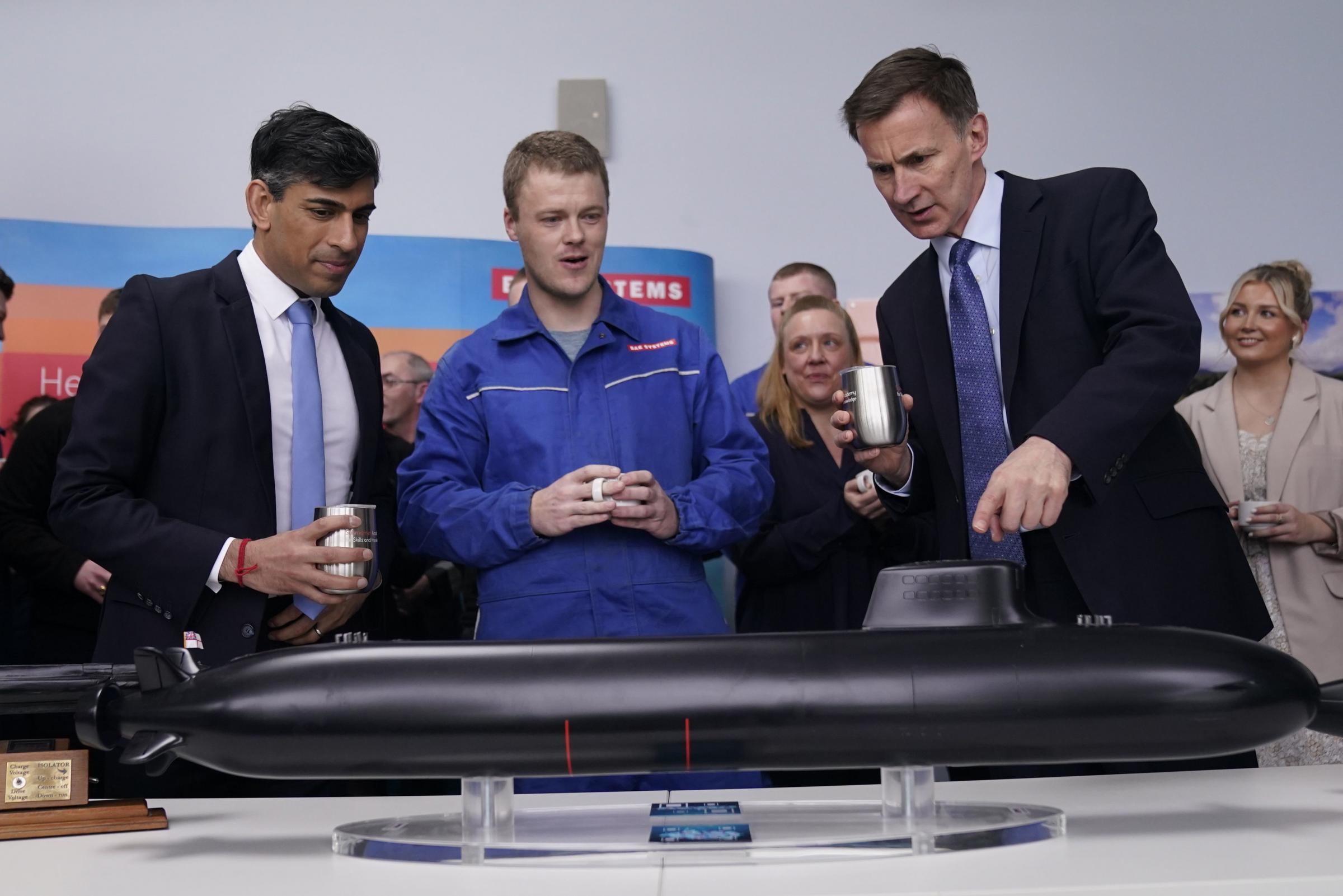 Prime Minister Rishi Sunak and Chancellor of the Exchequer Jeremy Hunt during a visit to an engineering firm in Barrow-in-Furness, in Cumbria. The Prime Minister has touted a new fund backed by 20 million in public money to secure the future of the UKs