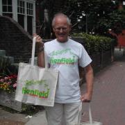 Tony Jackson, Henfield Community Partnership chairman, with a cloth bag