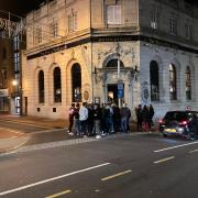 Stock image of pub goers outside the Post and Telegraph in Brighton