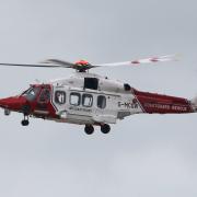 A man has been rescued from Sussex waters by helicopter