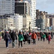 People on Brighton seafront
