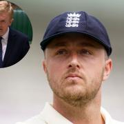 Ollie Robinson's suspension from international cricket has been criticised  by Oliver Dowden (inset)