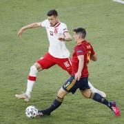 Jakub Moder in action for Poland versus Spain at Euro 2020
