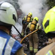 'Keep you windows closed' - firefighters called to garage fire
