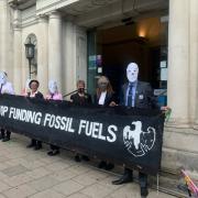 Extinction Rebellion protesters held a 'crisis talk' Barclays in North Street today.