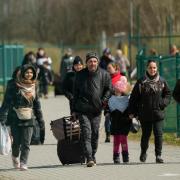 Refugees at the Ukrainian border: credit - PA