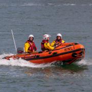 An RNLI crew was called to the aid of a kite surfer in Worthing