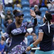 Serena Williams celebrates with Ons Jabeur at Eastbourne last night