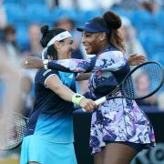 Ons Jabeur, left, and Serena Williams celebrate victory after their ladies doubles match yesterday on day five of the Rothesay International Eastbourne at Devonshire Park: credit - PA