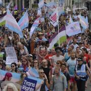 People marching along Brighton seafront at Trans Pride in 2019: credit - Terry Applin