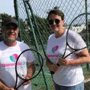 Badgers member Phil Grant gets ready to hit the court along with Dementia UK regional fundraiser Holly Markham
