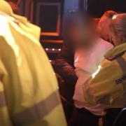 Officers de-arrested the man and took him home after he kicked a waitress at a strip club: credit - Channel 4/Nightcoppers