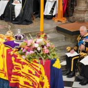 King Charles III and Camilla, the Queen Consort, sat near to the Queen's coffin during the state funeral at Westminster Abbey