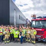 Fire crews in front of the new Horsham fire station, which will open next year