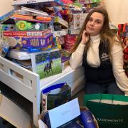 CJ Cooper, from Henfield, with toys she will be donating to childrens' hospices