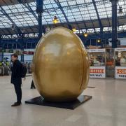 People travelling through Brighton Station spotted the giant egg promoting the star-studded pantomime