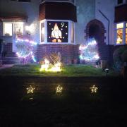 Homes on the estate have festive scenes in their windows