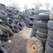 Environment crime officers discovered surplus tyres piled high at the site in Chichester