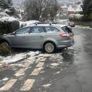 A car skidded off the road and into a hedge in Patcham