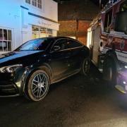 A Mercedes Benz blocked a fire engine that was on call