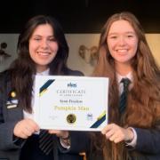 Lydia and Chaya hold the certificate