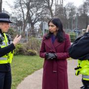Home Secretary Suella Braverman met with Sussex Police Chief Constable Jo Shiner, left, and Inspector James Ward in Brighton