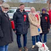 John Hewitt, centre left, Amanda Grimshaw and dog Mable, centre, and Faiza Baghoth, centre right, have been out campaigning in Hangleton and Knoll